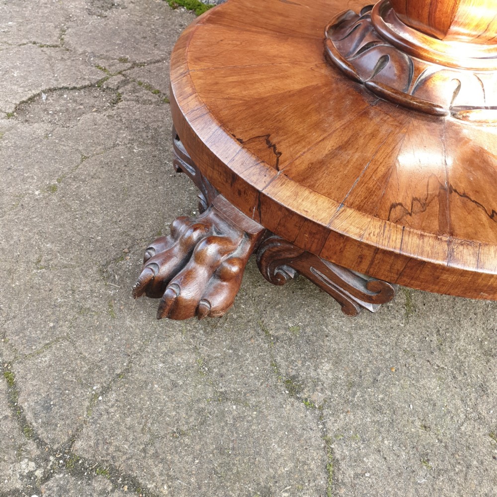 Early Victorian rosewood pedestal tip top circular table.  View II