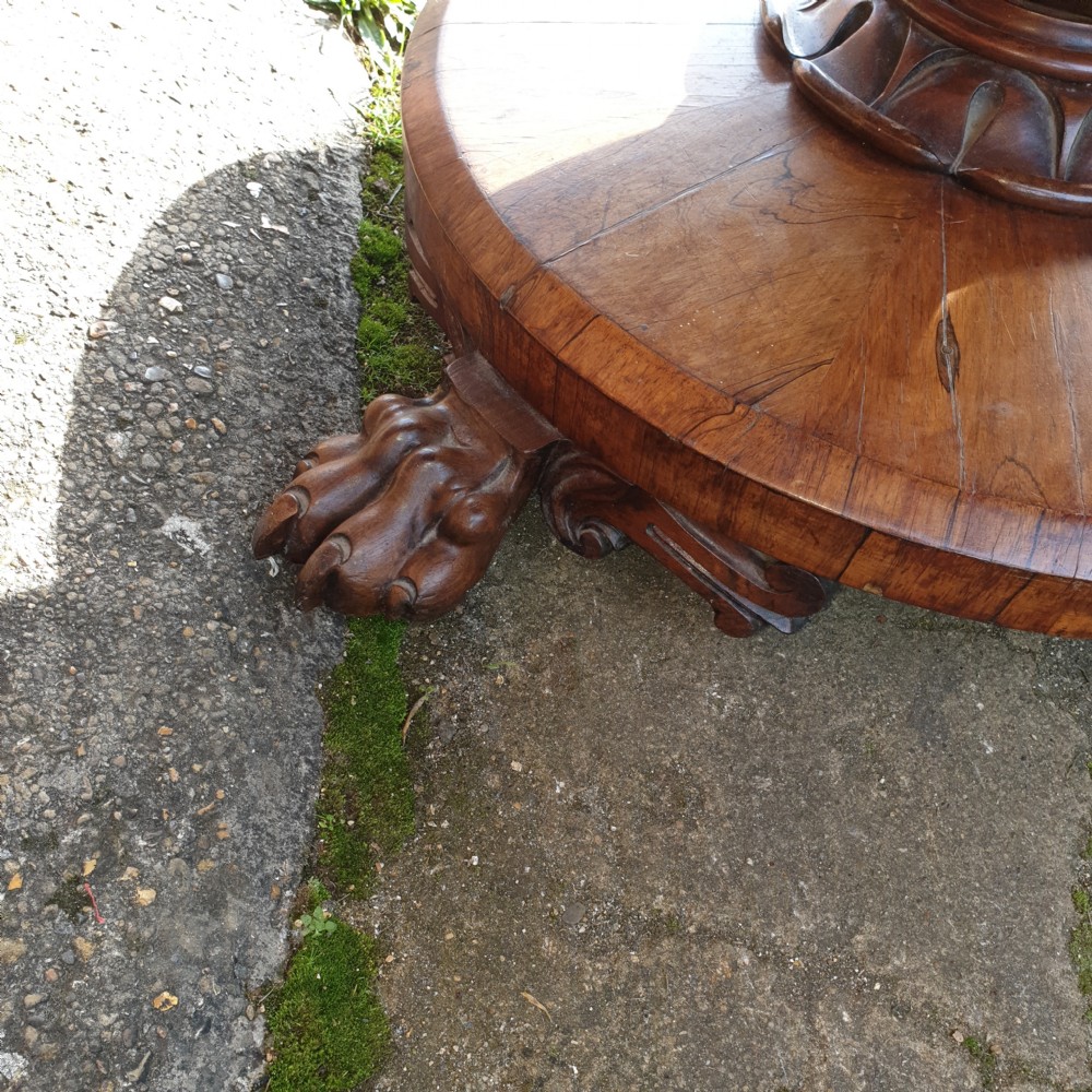 Early Victorian rosewood pedestal tip top circular table.  View III