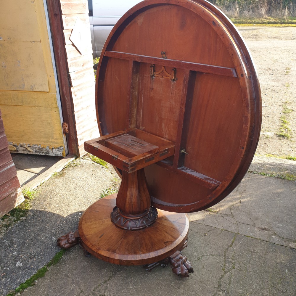 Early Victorian rosewood pedestal tip top circular table.  View IV