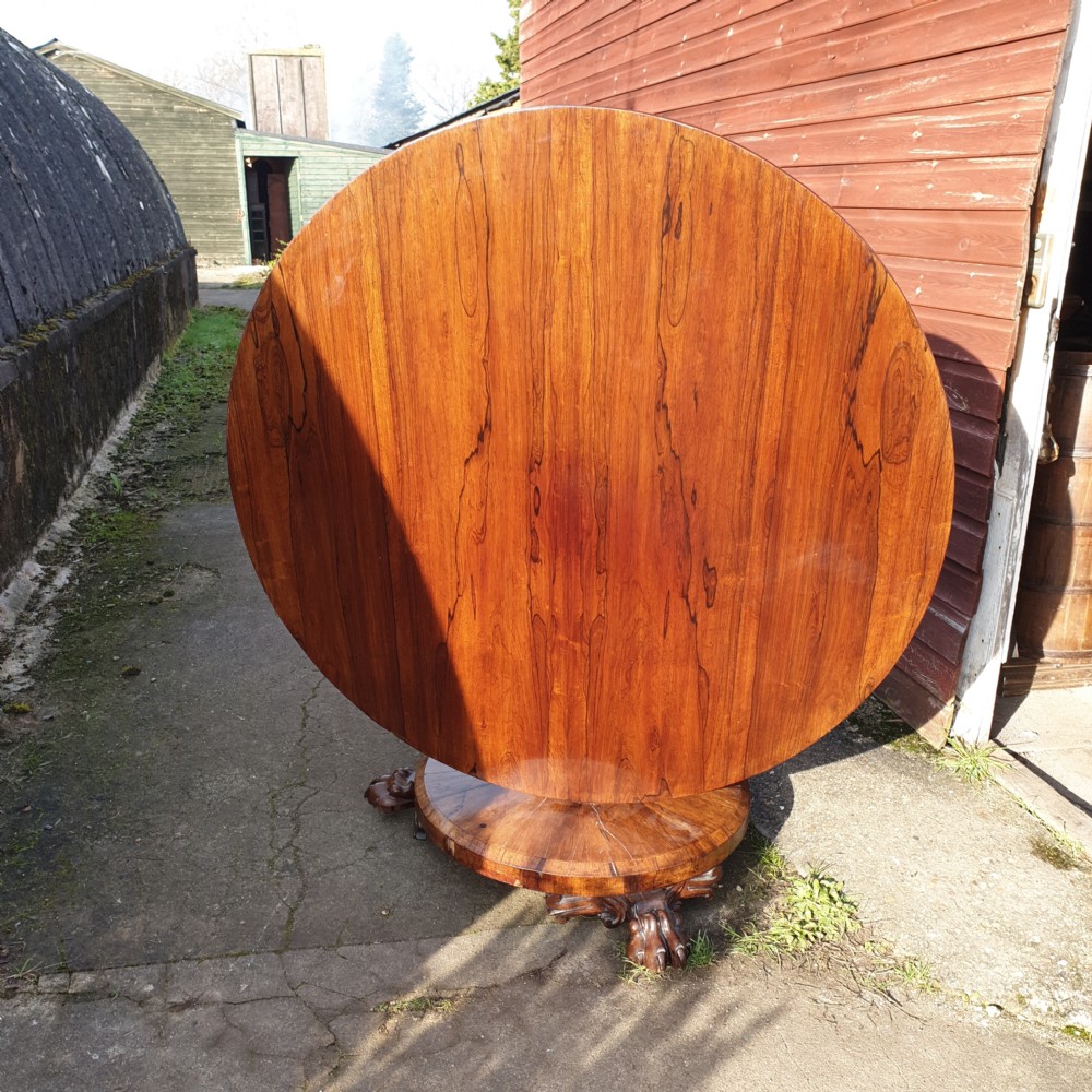 Early Victorian rosewood pedestal tip top circular table.  View V