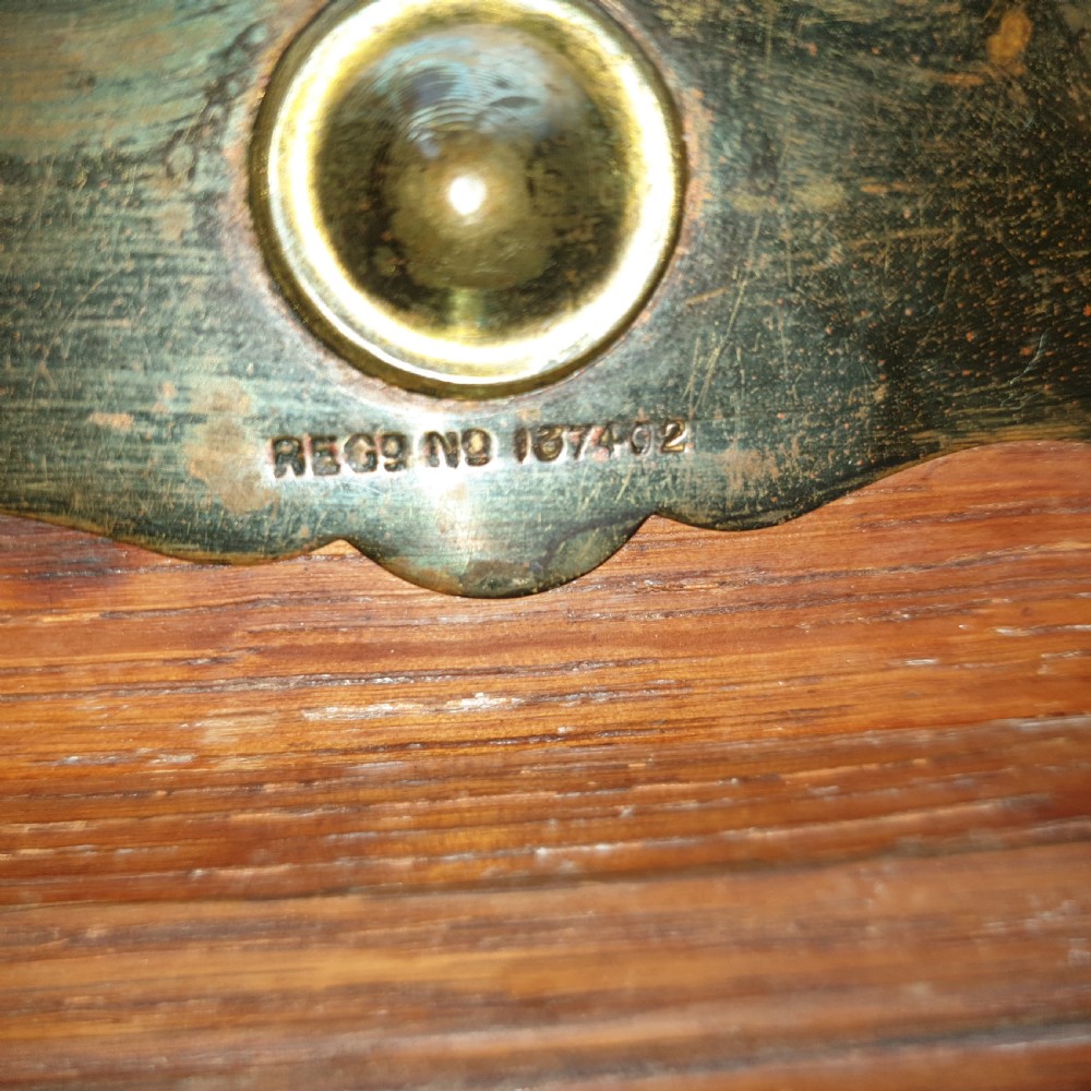 Unusual late Victorian oak side table. View II