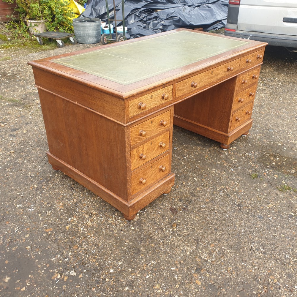 Good sized oak kneehole pedestal writing desk  View IV