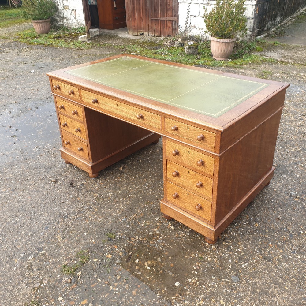 Good sized oak kneehole pedestal writing desk  View V