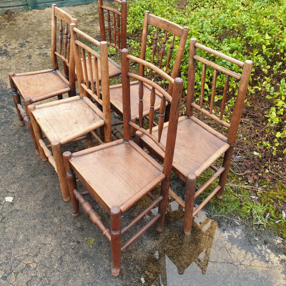 Harlequin set of early 19th century wood seat country chairs. View III