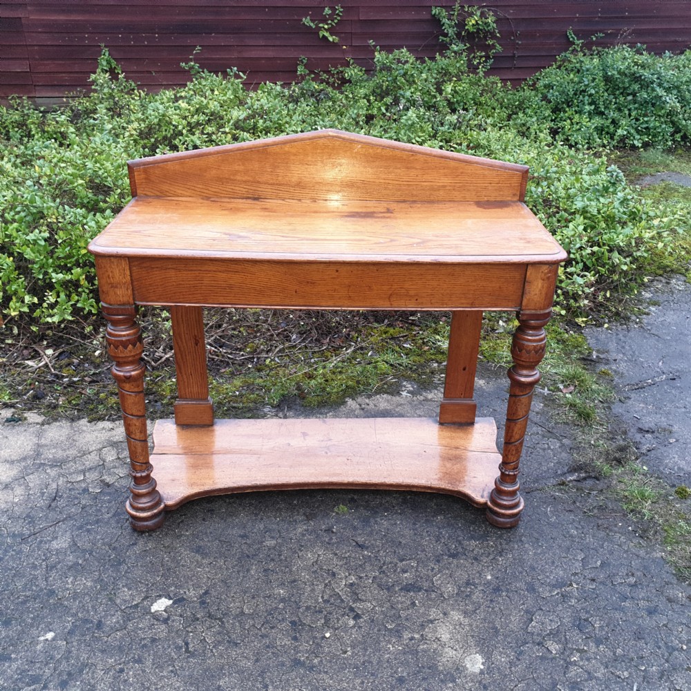 Victorian  golden oak hall table with end drawer.