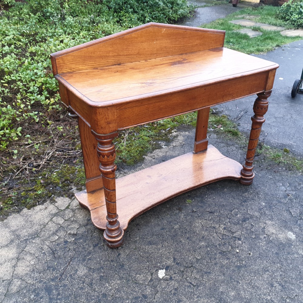 Victorian  golden oak hall table with end drawer. View III