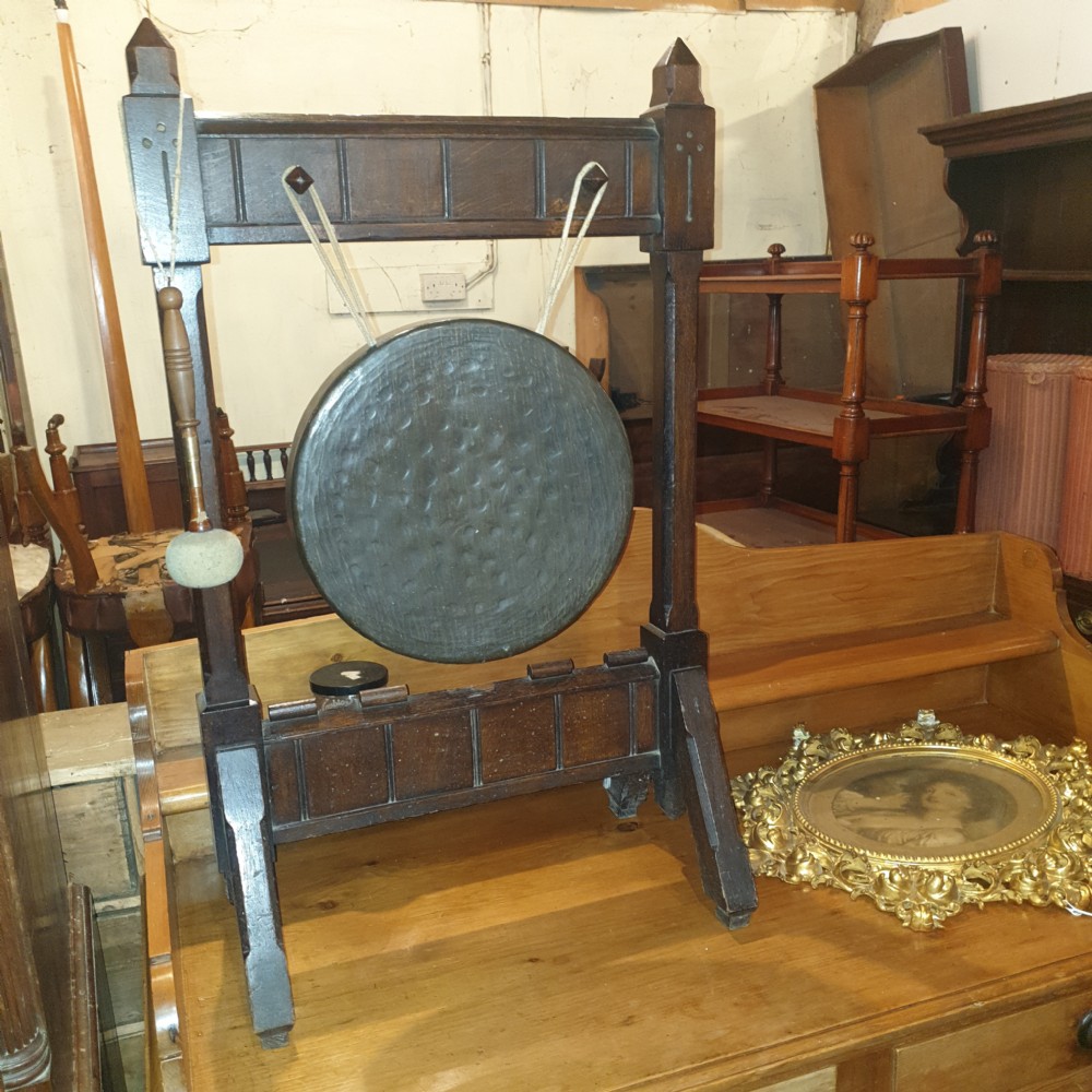 Late Victorian oak Gothic dinner gong.  View II