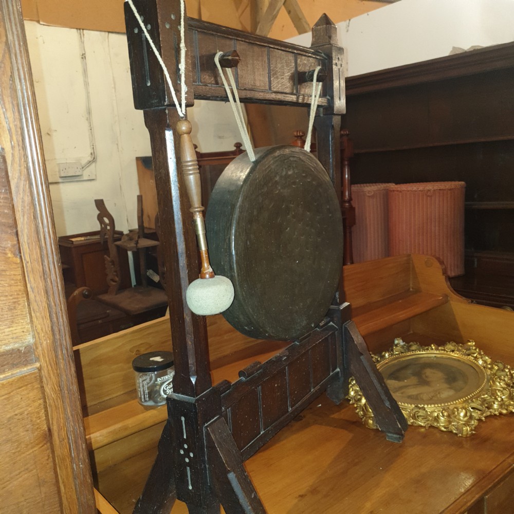 Late Victorian oak Gothic dinner gong.  View VI