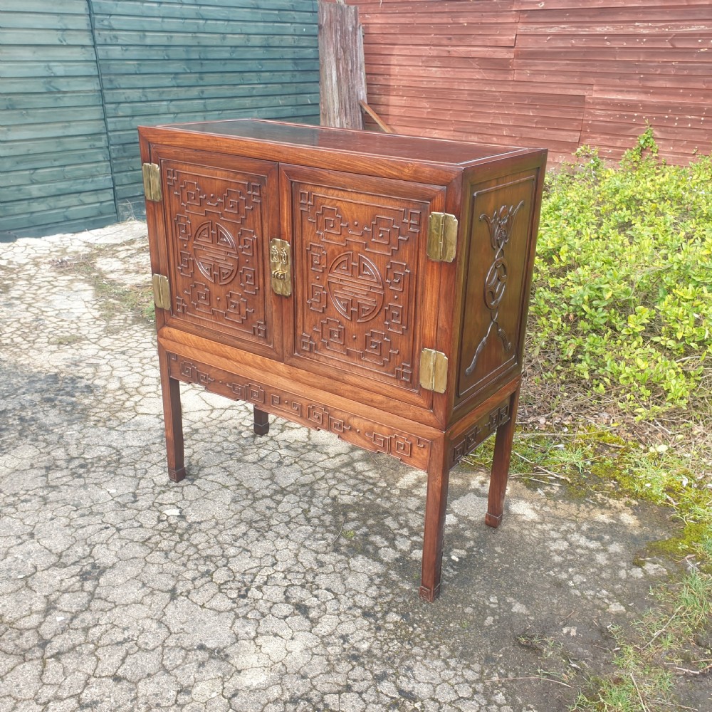 Lovely quality carved 2 door Chinese cabinet on stand. 