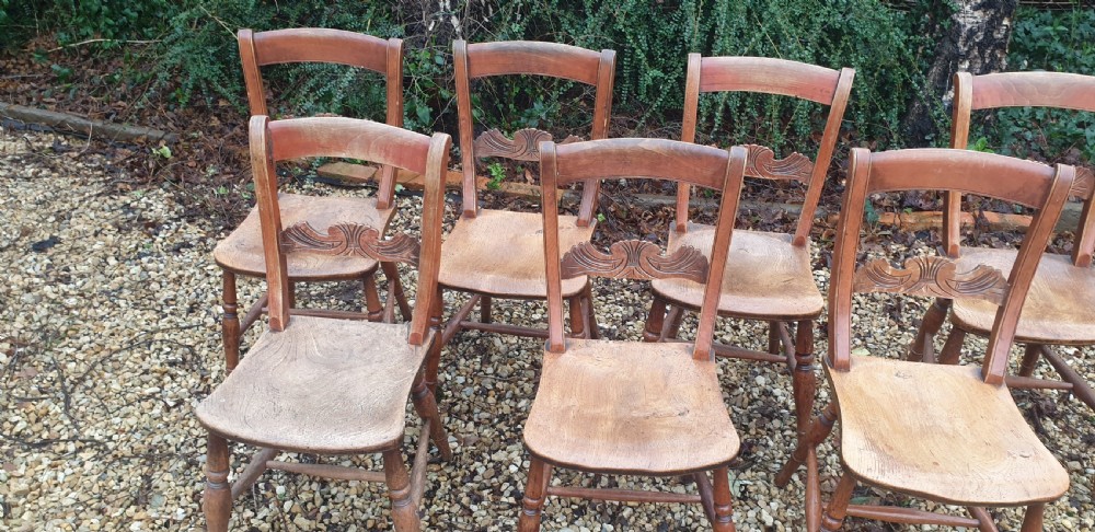 Set of 7 farmhouse Windsor kitchen single chairs. View IV