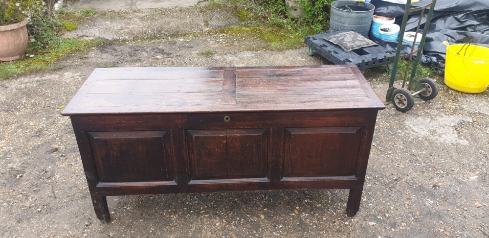 Large late Georgian panelled oak coffer.  View III
