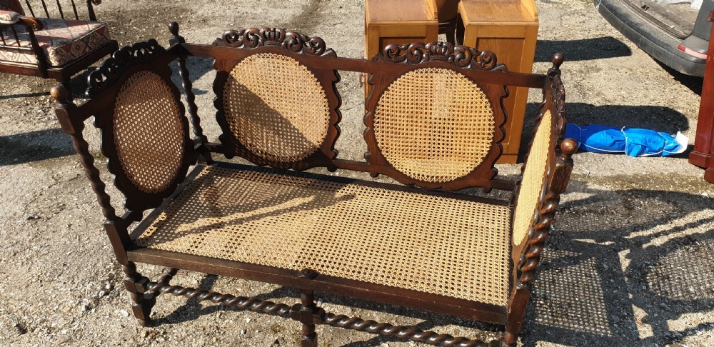 Carved oak and caned hall seat.  View VI