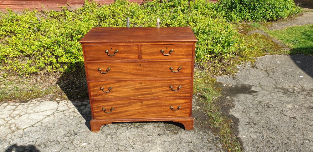 Good practical late Georgian mahogany chest of drawers.  View IV