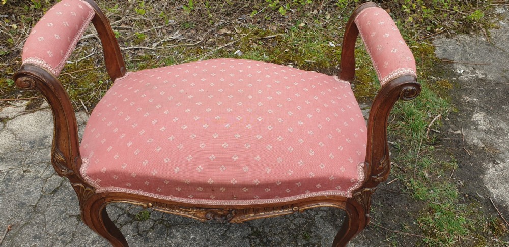 Late 19th century carved walnut dressing stool.  View II