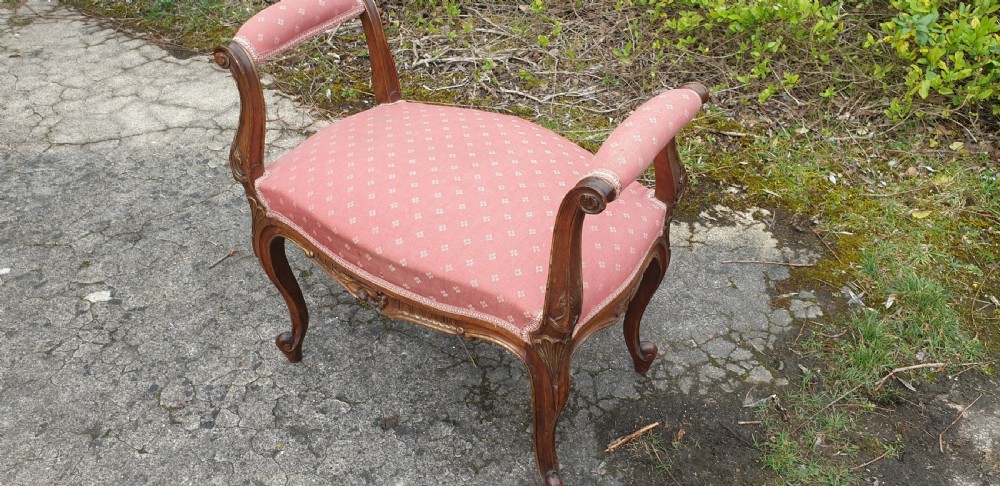 Late 19th century carved walnut dressing stool.  View III