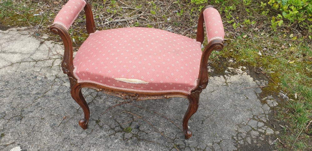Late 19th century carved walnut dressing stool.  View IV