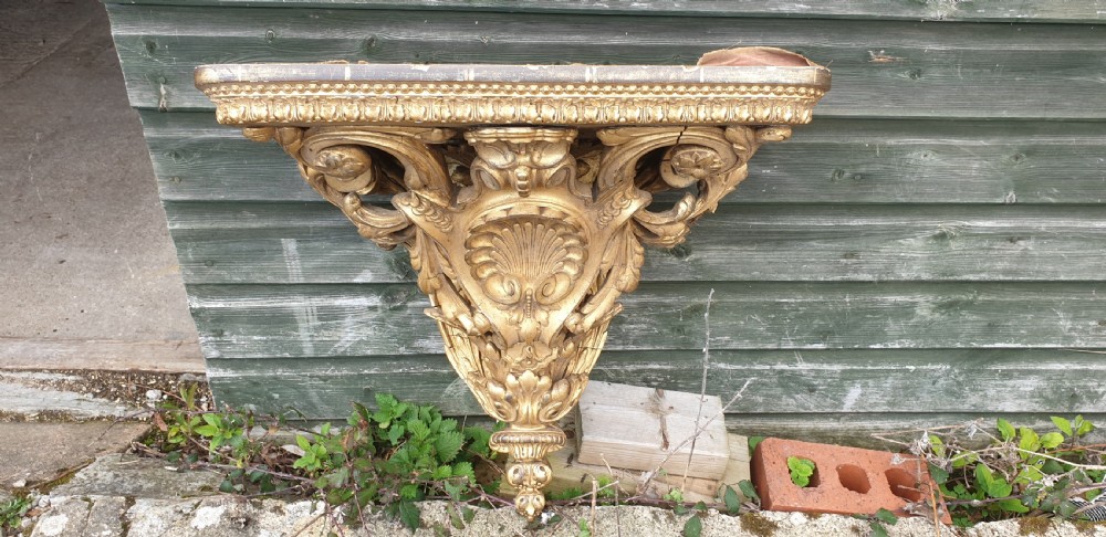 Large 19th century gilt clock wall bracket.