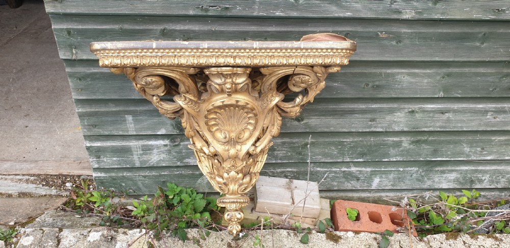Large 19th century gilt clock wall bracket. View II