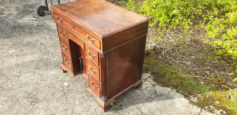 Small 19th century mahogany kneehole writing desk.  View II