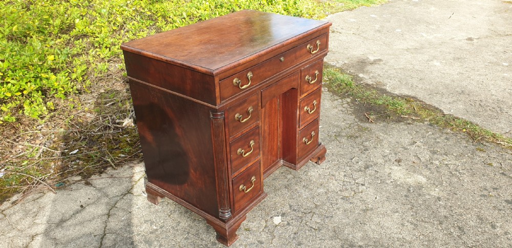 Small 19th century mahogany kneehole writing desk.  View IV