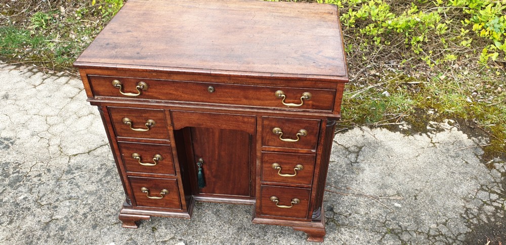 Small 19th century mahogany kneehole writing desk.  View X