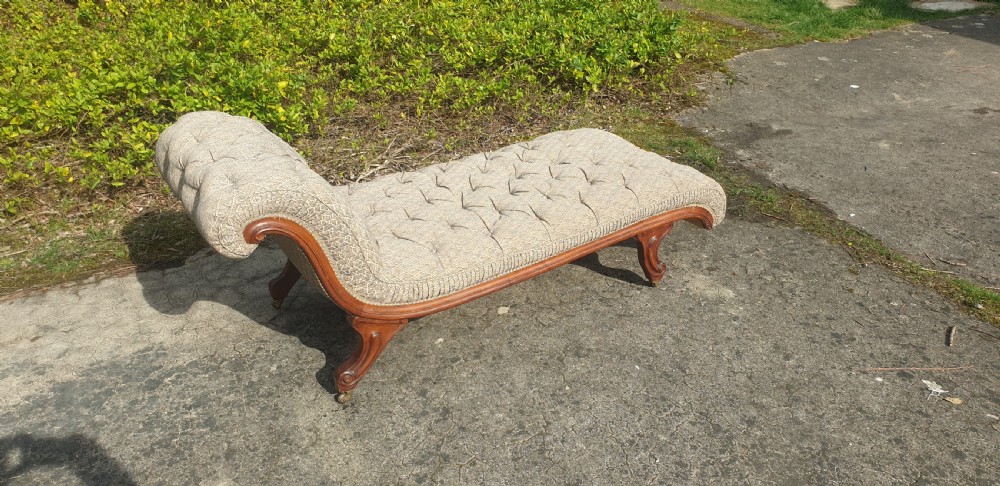 Victorian walnut upholstered chaise longue. 