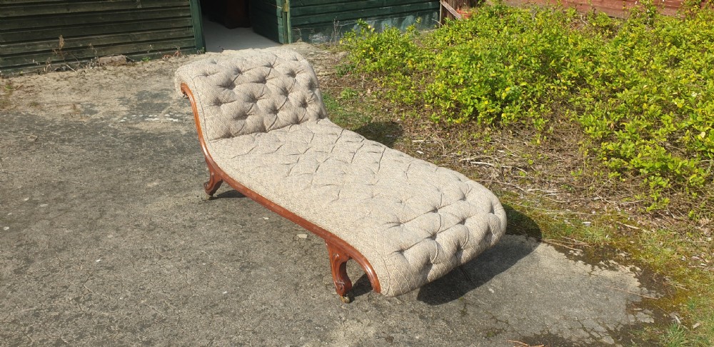 Victorian walnut upholstered chaise longue.  View II