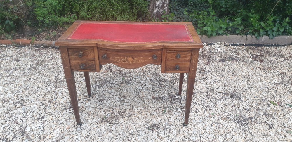 Late Victorian inlaid rosewood writing table. 