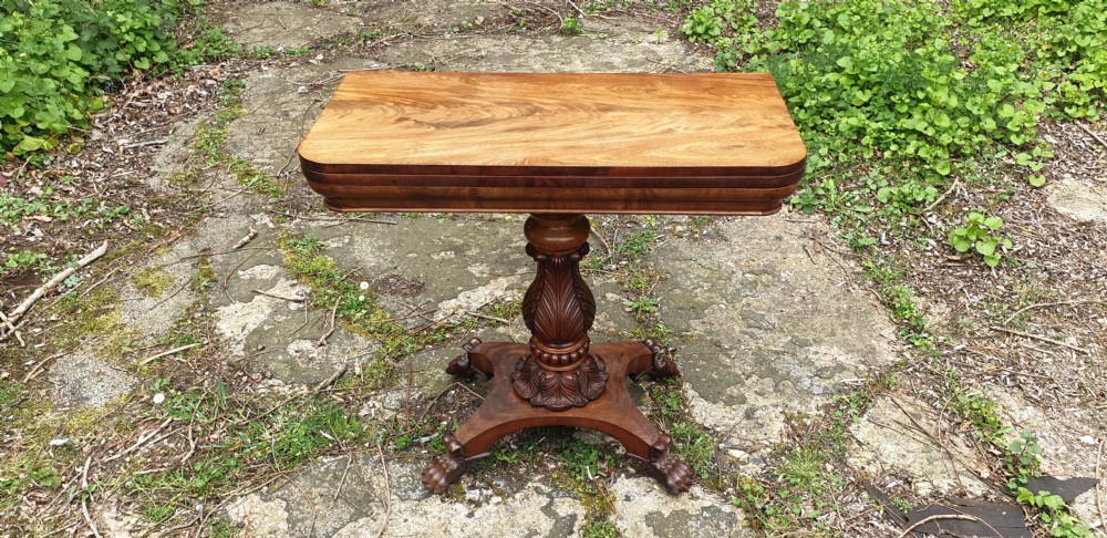 19th century mahogany fold over top table.