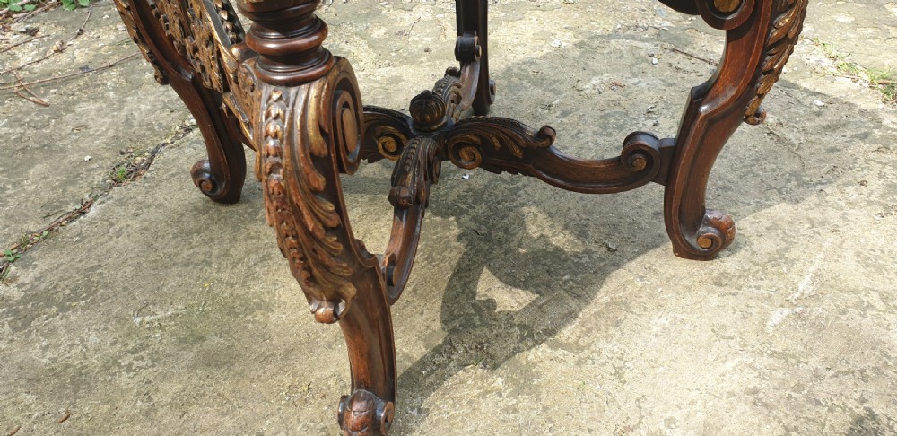 Carved walnut and gilt heightened stool. View VII