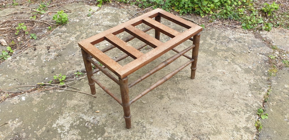 Edwardian mahogany slatted luggage stand.