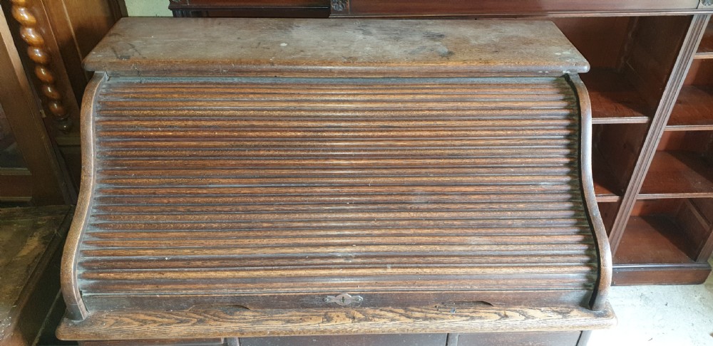 Small oak tambour roll top pedestal desk. View II