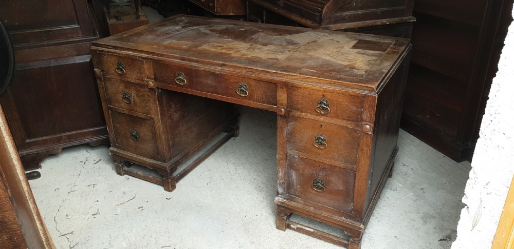 1920s oak kneehole pedestal desk.  View IV