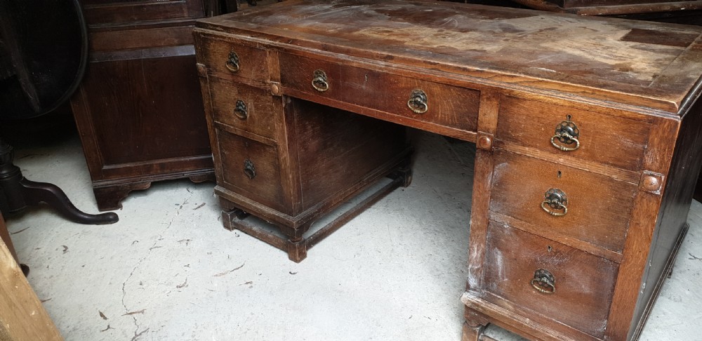 1920s oak kneehole pedestal desk.  View VI