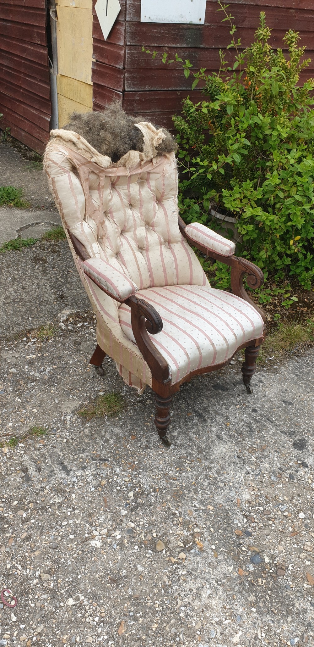 Early Victorian rosewood framed upholstered armchair.  View VI