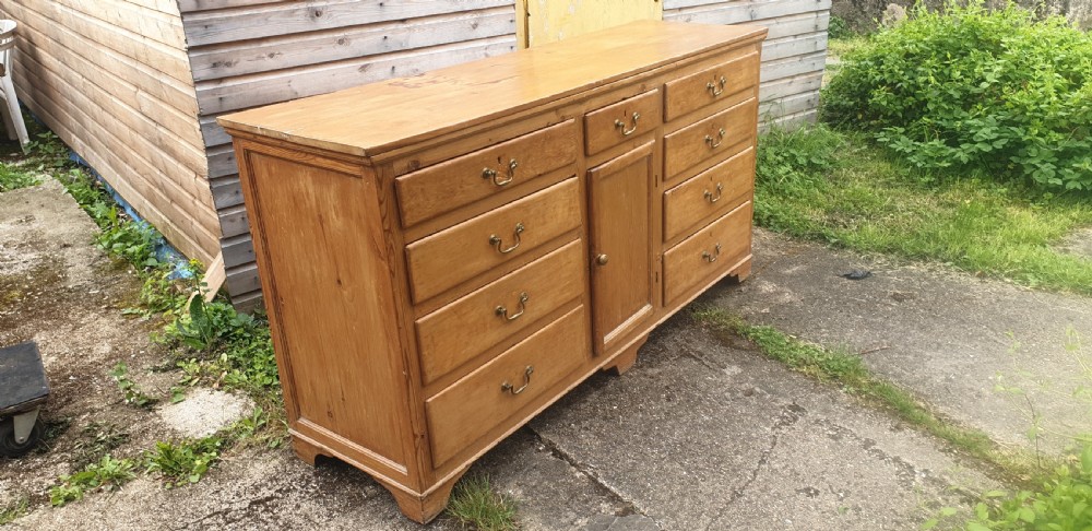 Early 19th century pine dresser base. View II