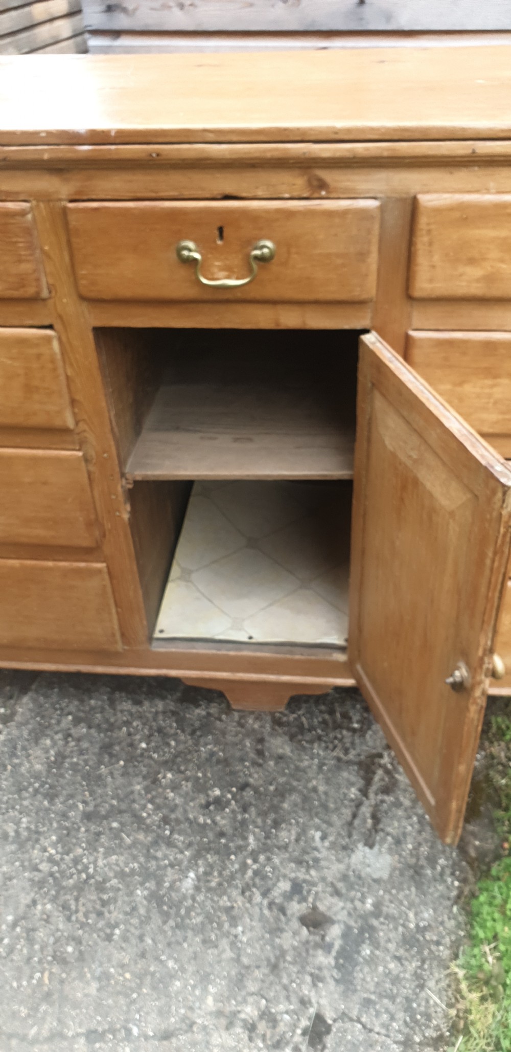 Early 19th century pine dresser base. View III