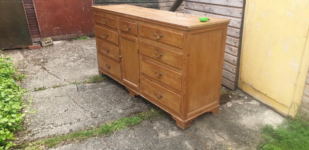 Early 19th century pine dresser base.
