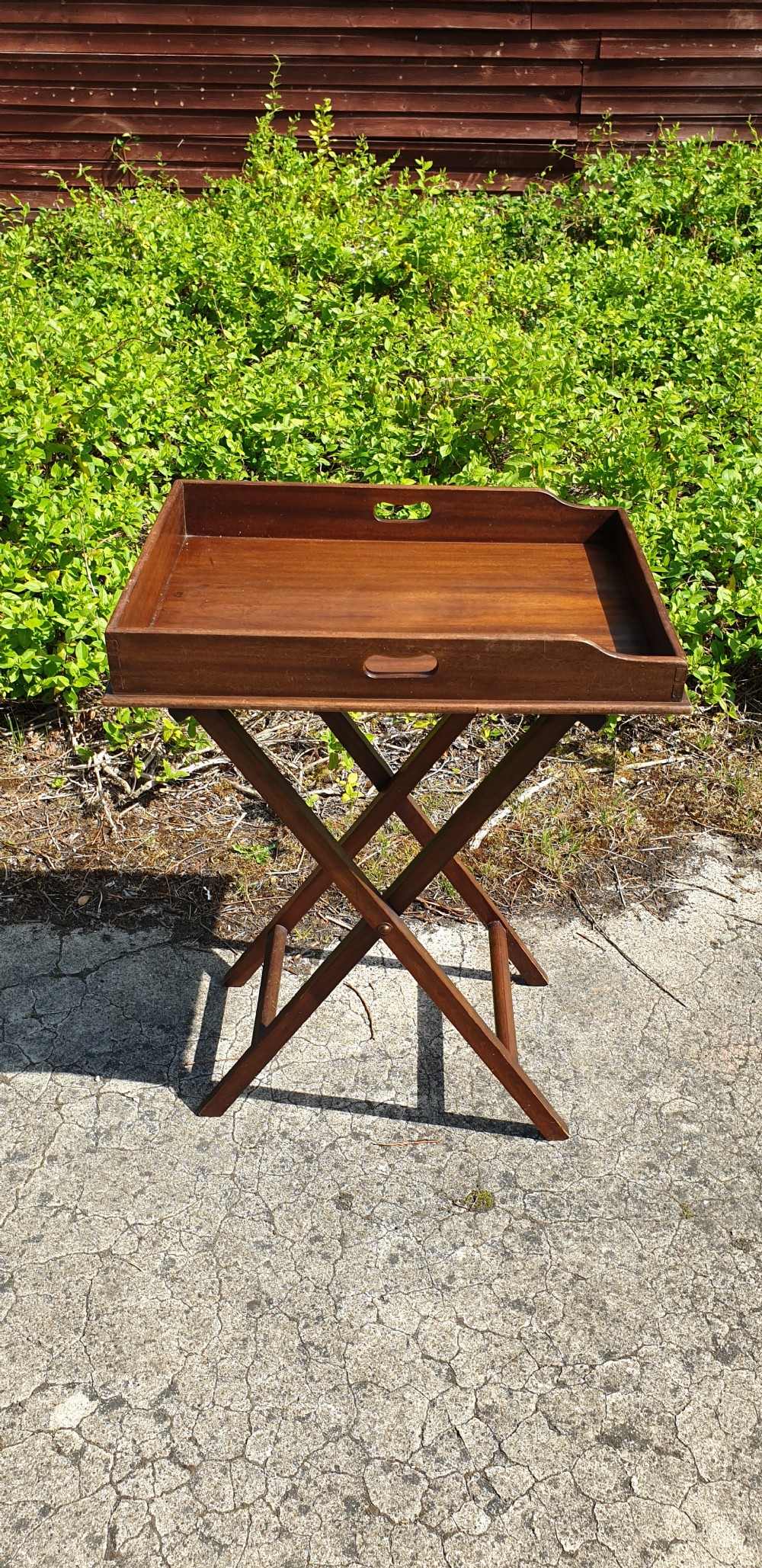 Late Victorian mahogany butlers tray on folding stand.  View II