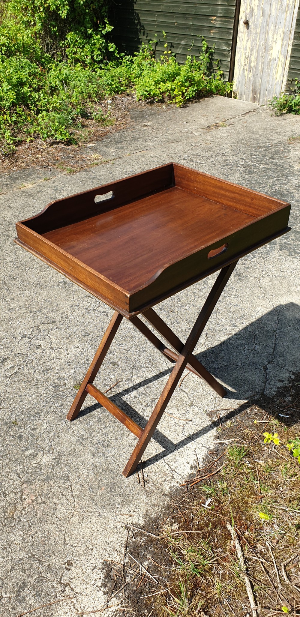 Late Victorian mahogany butlers tray on folding stand.  View III
