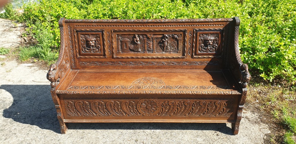 Good Victorian carved oak hall seat bench.
