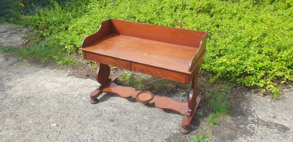 Mid Victorian mahogany hall table.  View II