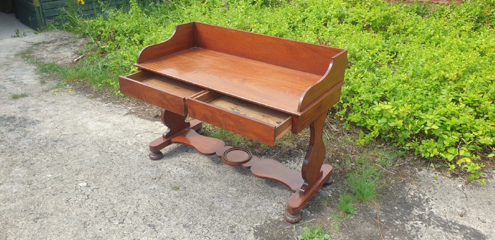Mid Victorian mahogany hall table.  View IV