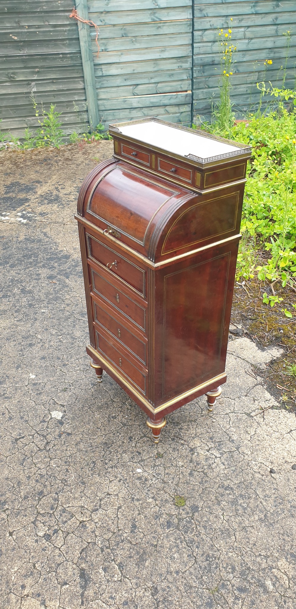 Delightful (18 inches width) brass inlaid mahogany cylinder top bureau cabinet.  View VI