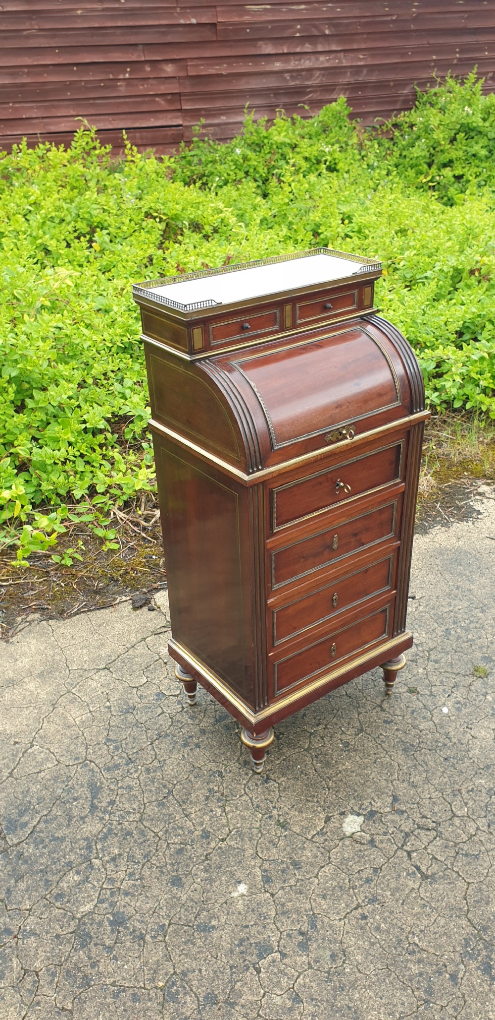 Delightful (18 inches width) brass inlaid mahogany cylinder top bureau cabinet.  View VII