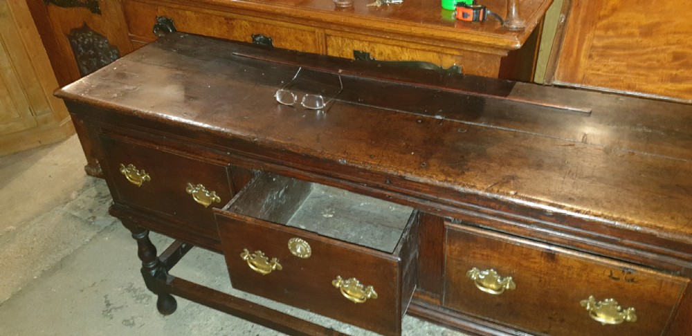 Late Georgian oak 3 drawer dresser base.  View IX