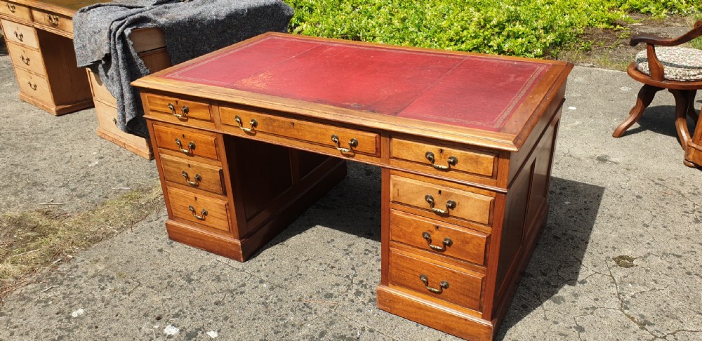Panelled mahogany kneehole pedestal desk of larger size. View II