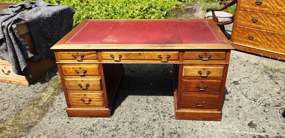 Panelled mahogany kneehole pedestal desk of larger size. View III