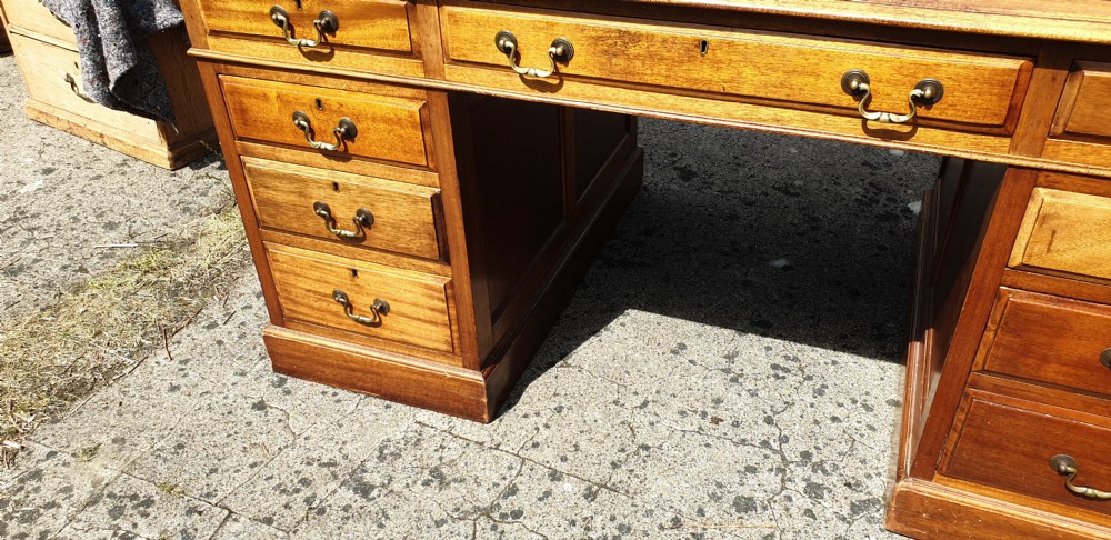Panelled mahogany kneehole pedestal desk of larger size. View V