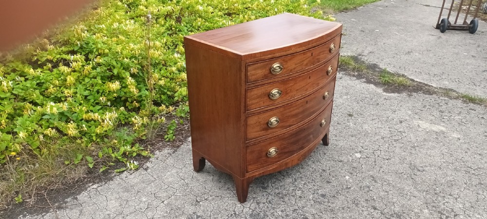 Regency inlaid bow front chest of 4l drawers. View III